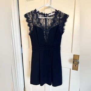 Black dress, v neck with lace, above knee length